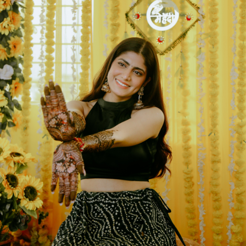 Candid Mehndi ceremony moments at Chandigarh wedding